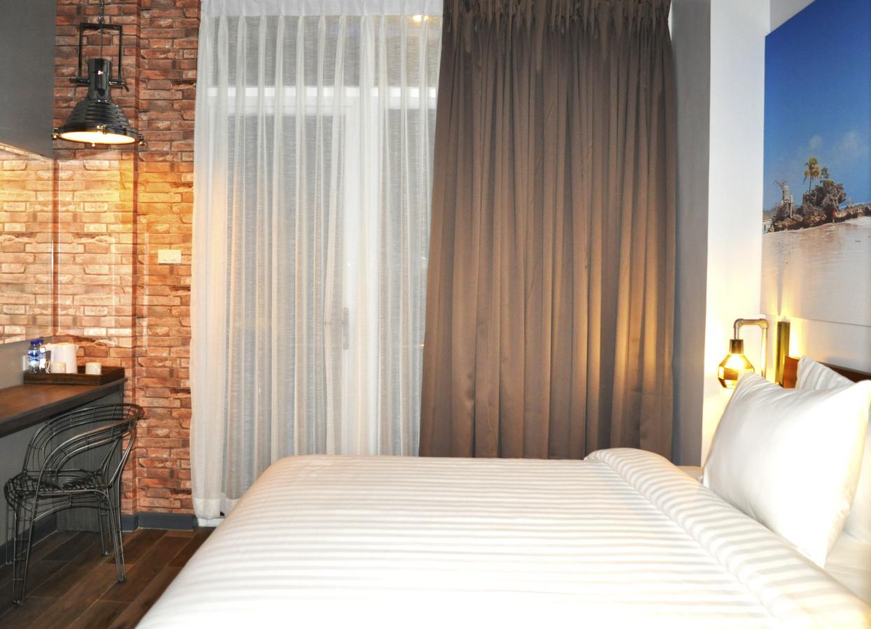 Gq Plaza Hotel Калибо Екстериор снимка